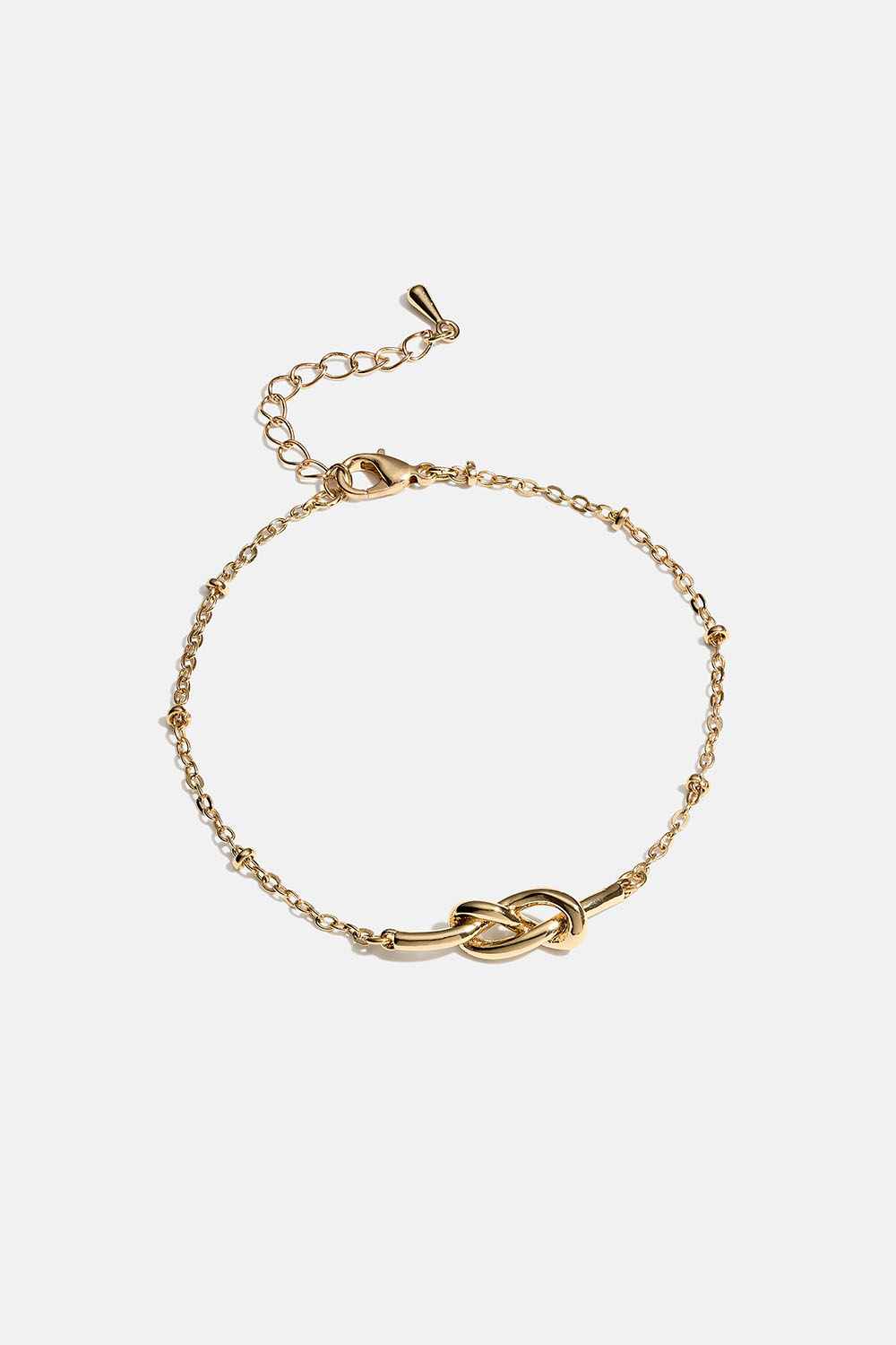 Guldfarvet armbånd med knude