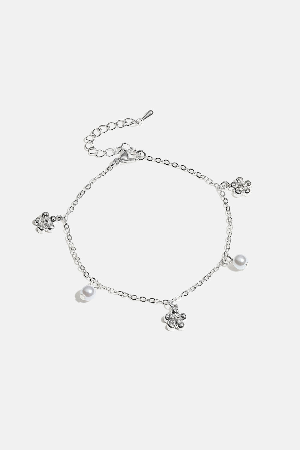 Armbånd med blomster og hvide perler