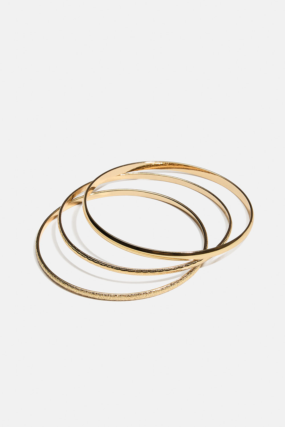 Tynde guldfarvede armringe, 3-pak