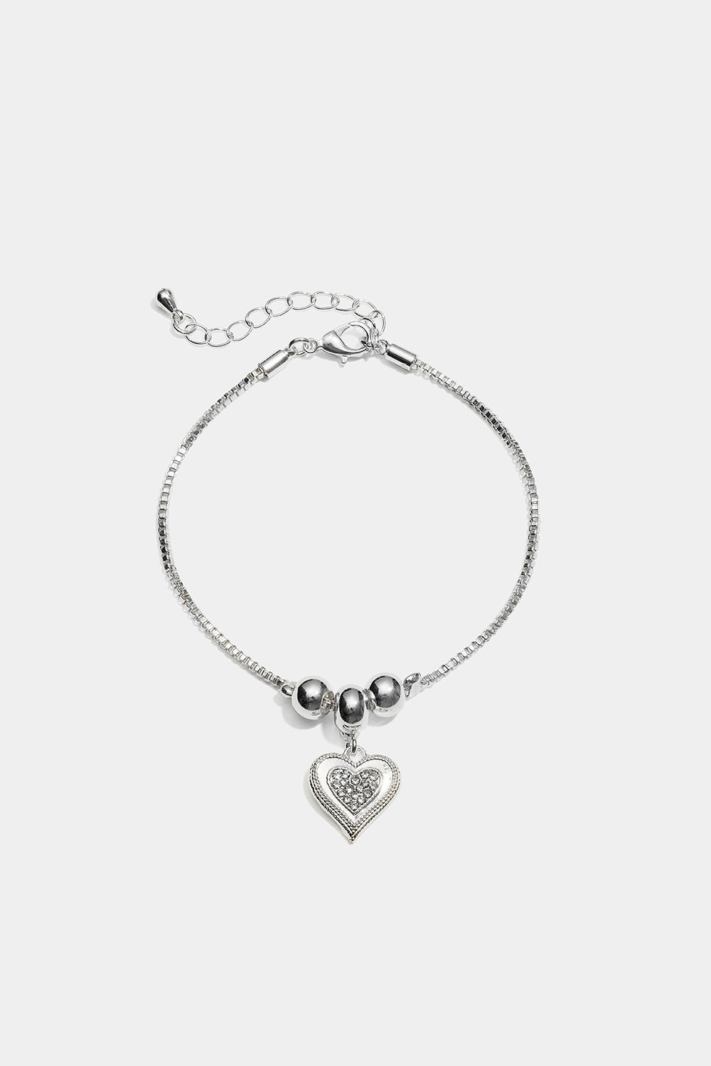 Armbånd med hjerteformet vedhæng