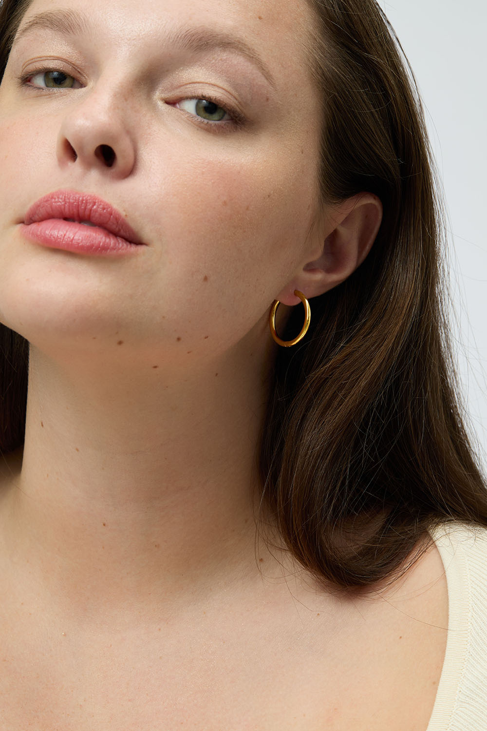 Hoops i stål med 18k guld