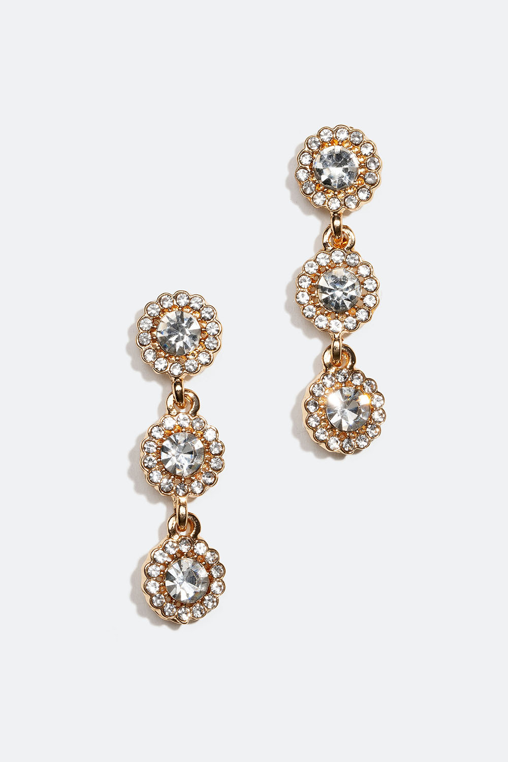 Guldfarvede rhinstensøreringe med tre runde glassten