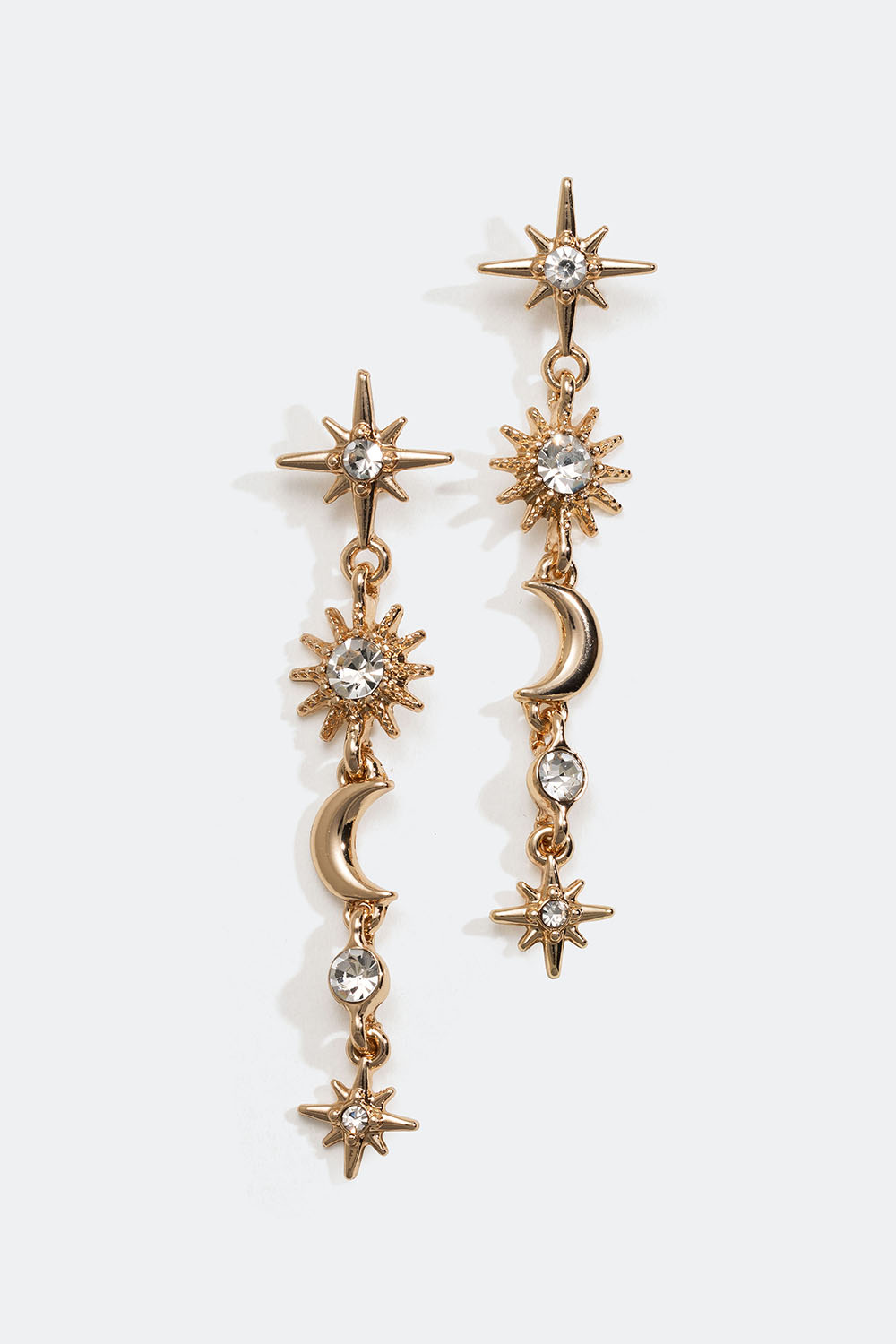 Guldfarvede øreringe med vedhæng af stjerner og måner