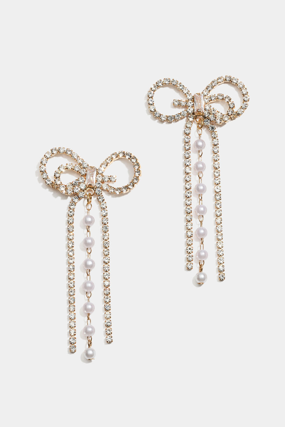 Guldfarvede sløjfeøreringe i rhinsten og perler