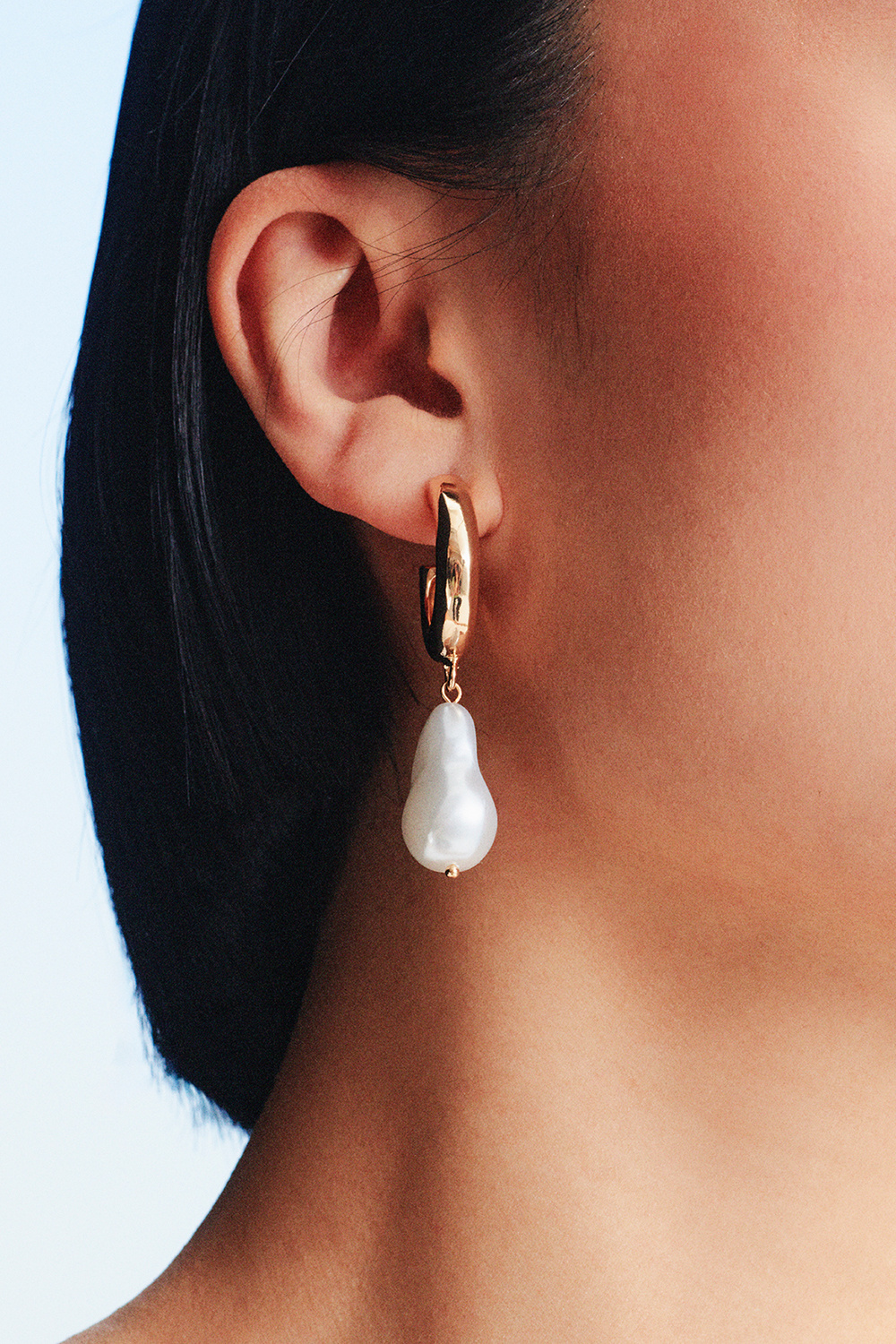 Guldfarvede hoops med stor perle