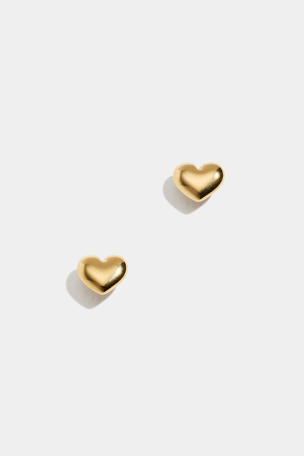 Ørestikker i hjerteformet stål med 18k guld