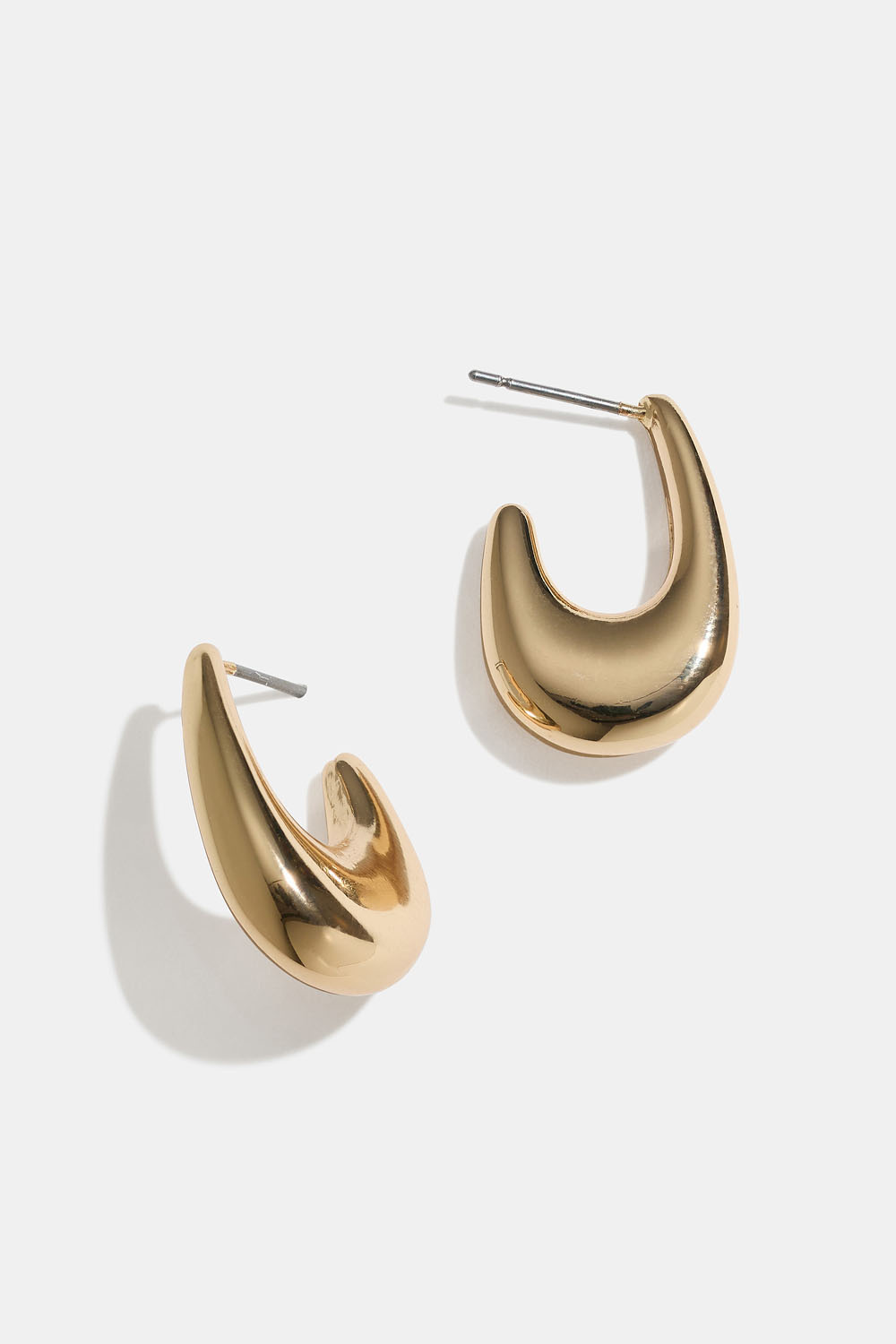 Guldfarvede hoops med oval form