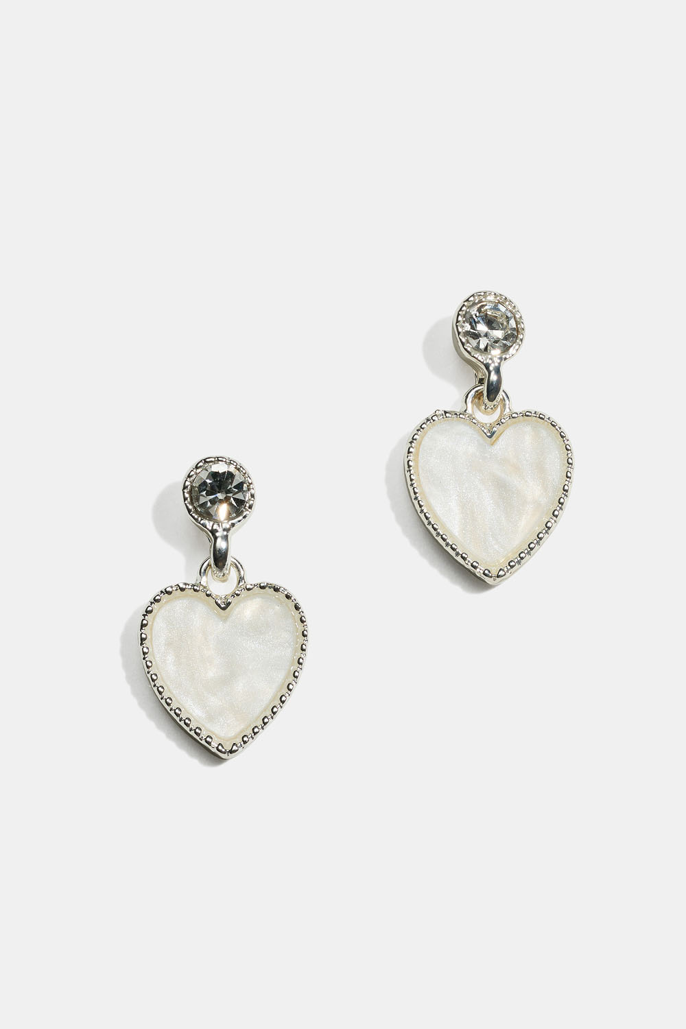 Øreringe med glitrende hjerter