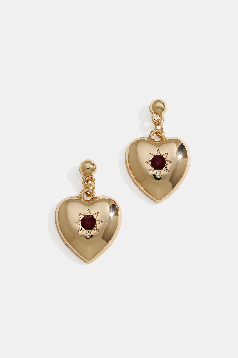 Guldfarvede hjerteøreringe med stjerner