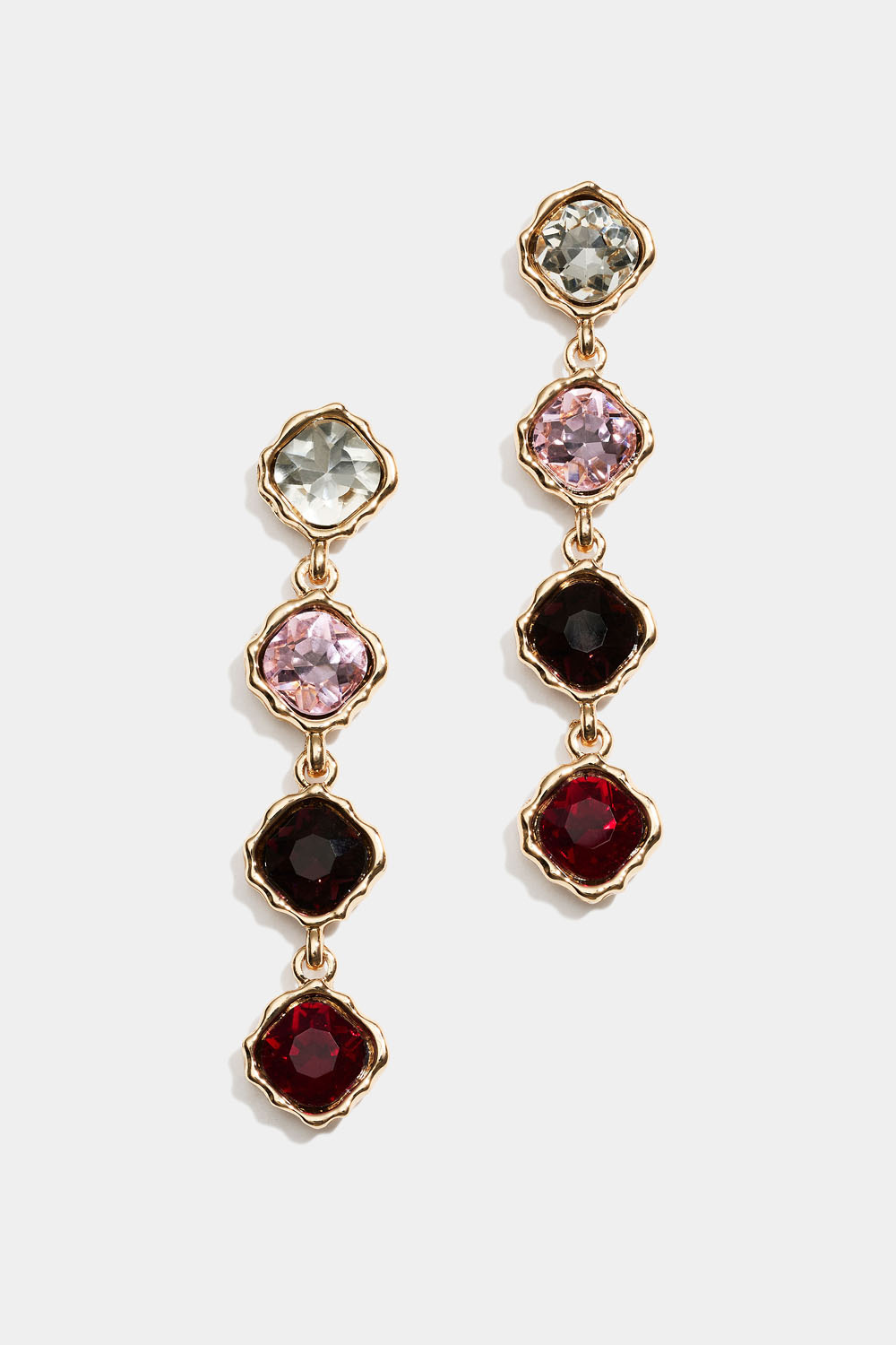 Øreringe med dinglende lyserøde og røde glassten 