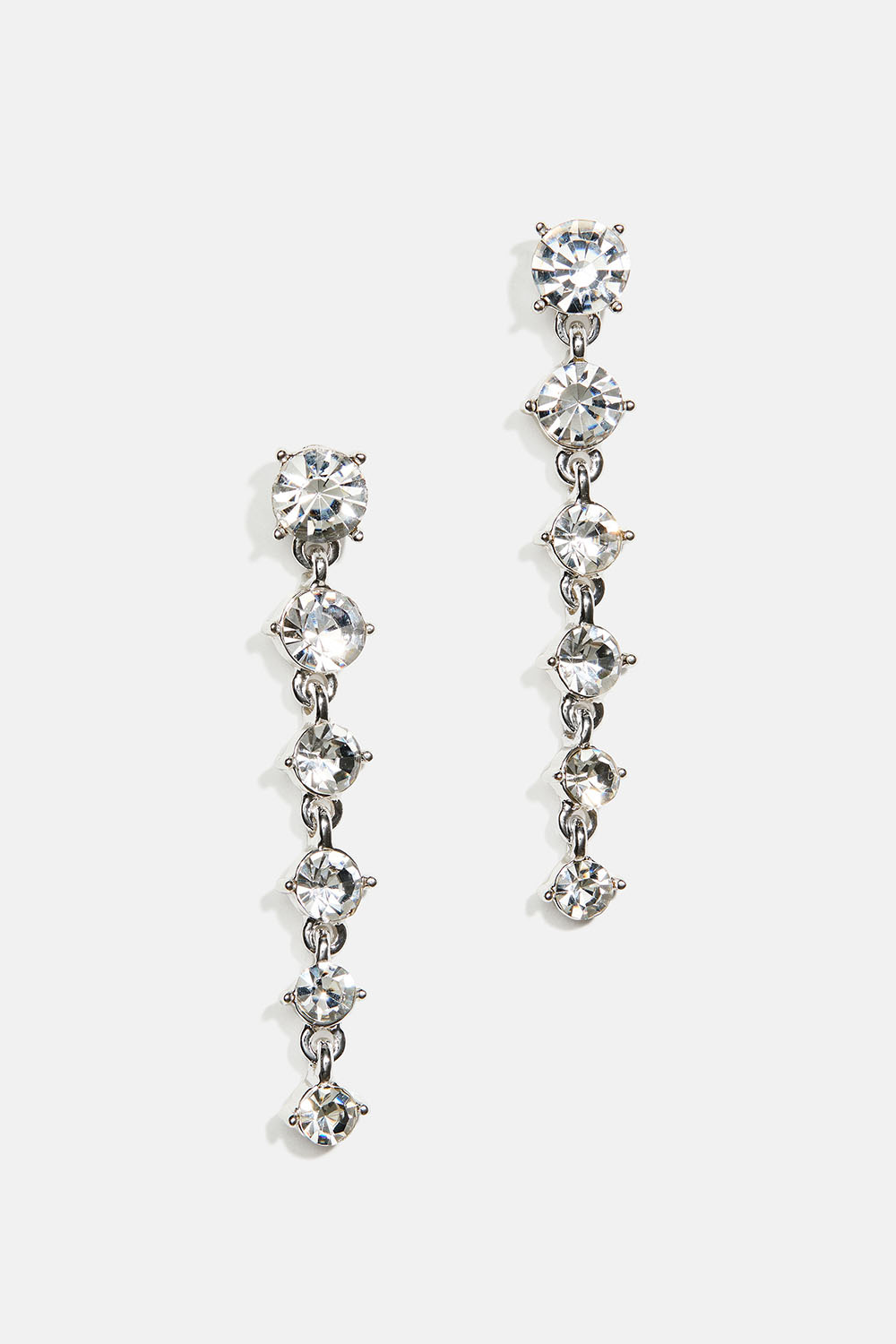 Øreringe med hvide runde glassten