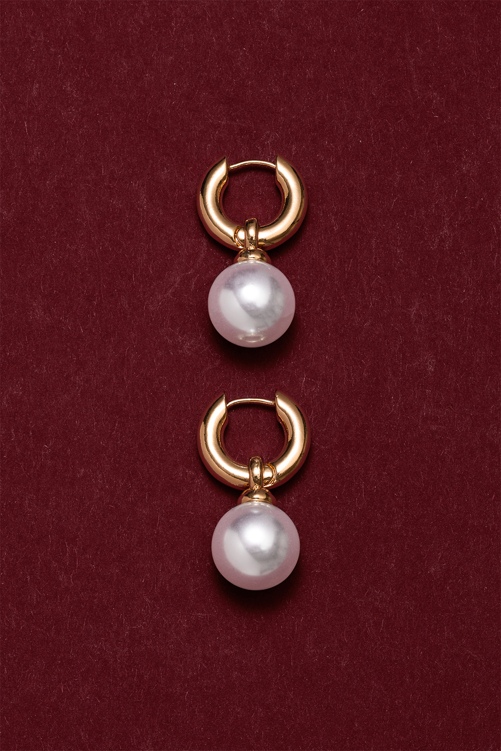 Guldfarvede chunky hoops med stor rund perle