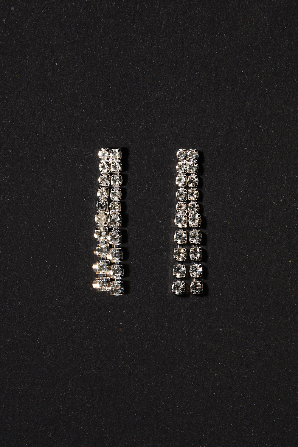 Sølvfarvede øreringe med similisten