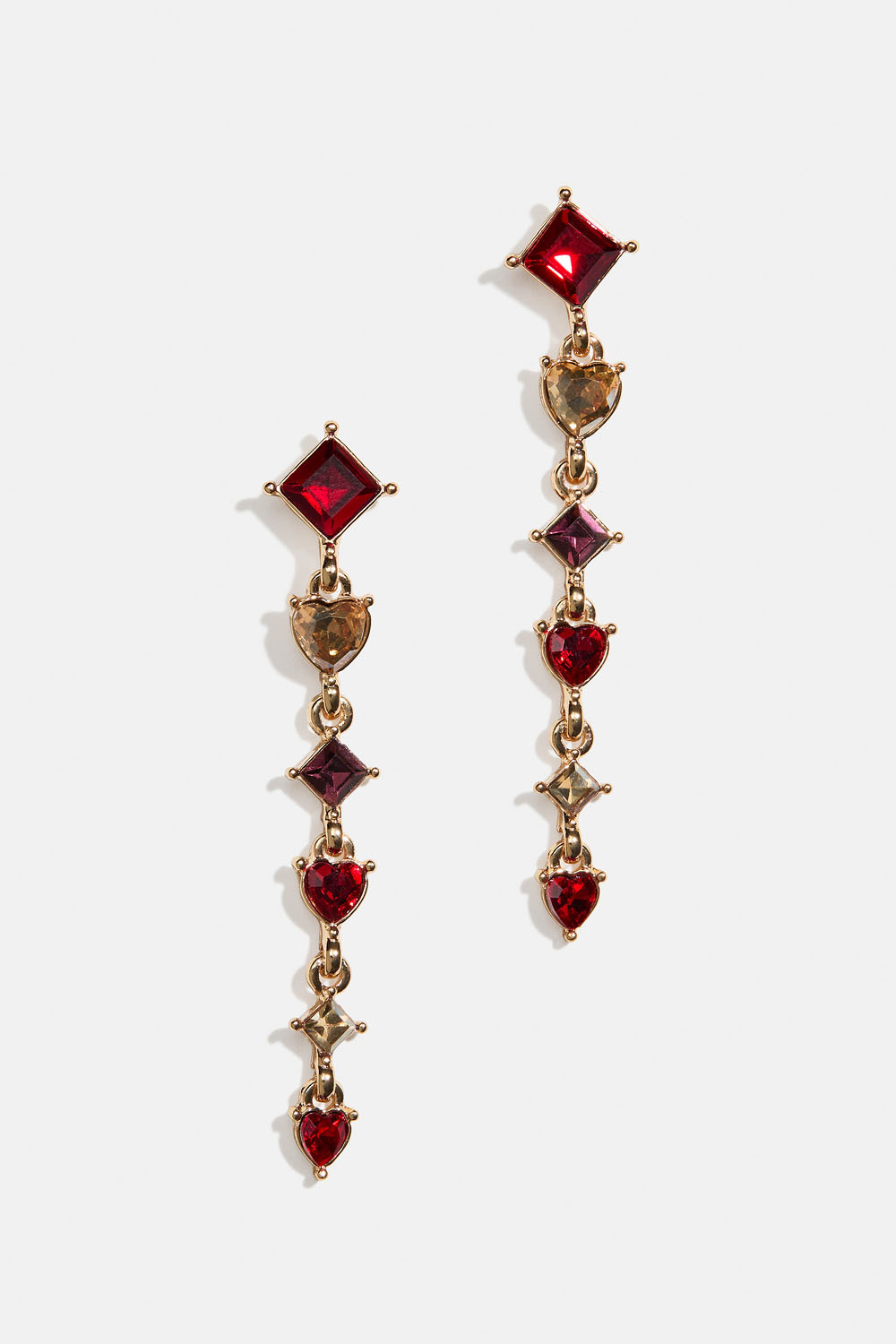 Øreringe med røde og beige hjerteformede glassten