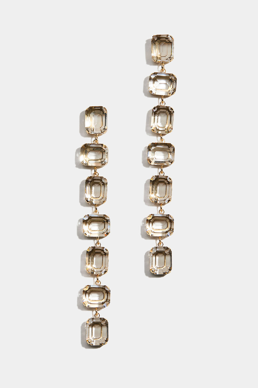 Øreringe med rektangulære hvide sten