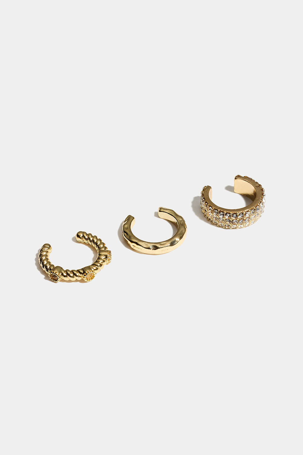 Guldfarvede ear cuffs med struktur og glassten, 3-pak