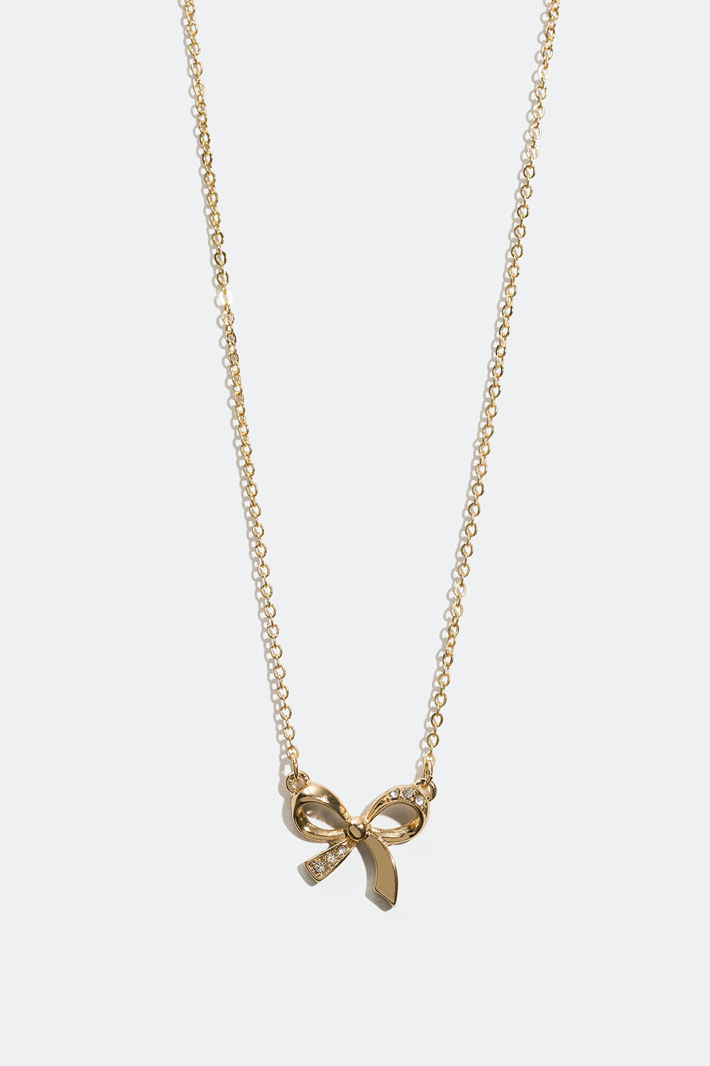 Guldfarvet halskæde med sløjfe og glassten