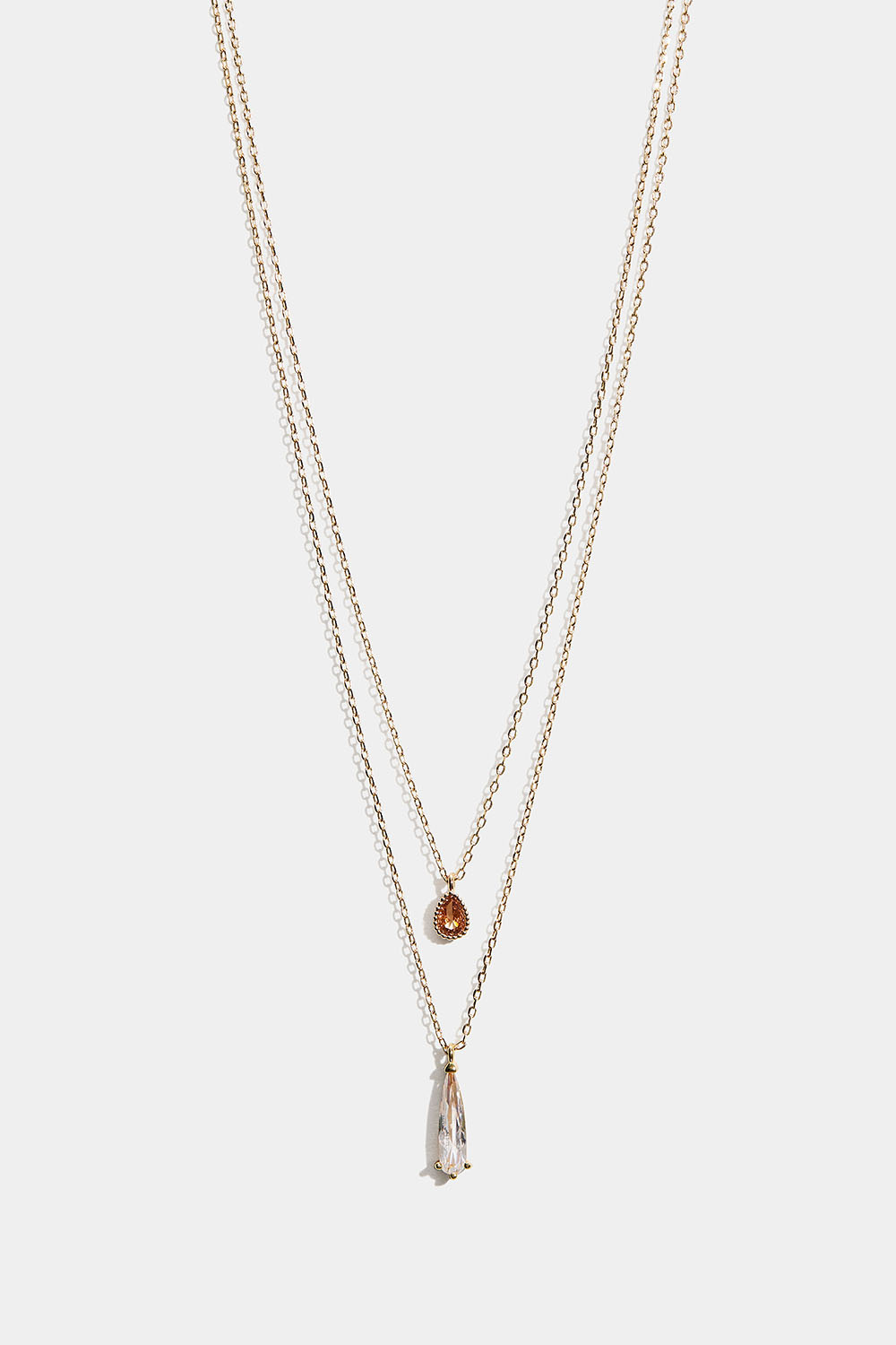 Guldfarvet dobbelt halskæde med dråbeformede vedhæng