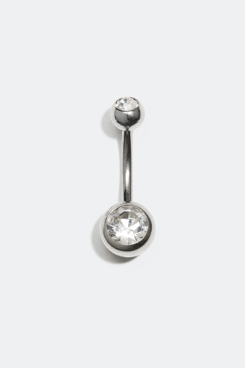 Navlepiercing med to sten