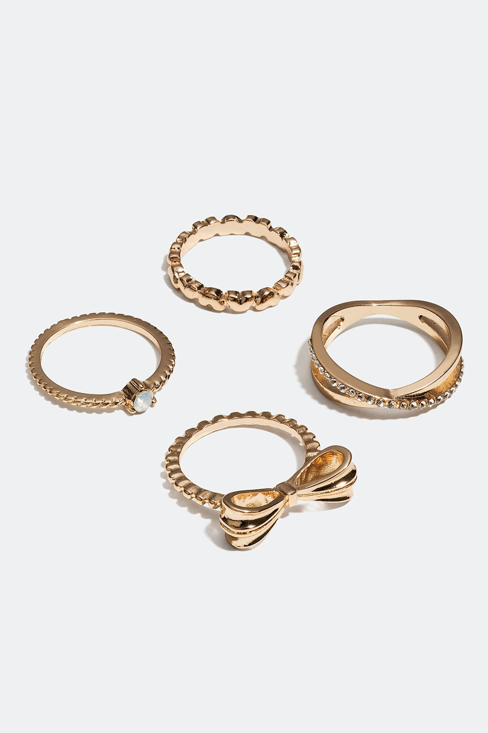 Guldfarvede ringe med sløjfer, hjerter og glassten, 4-pak