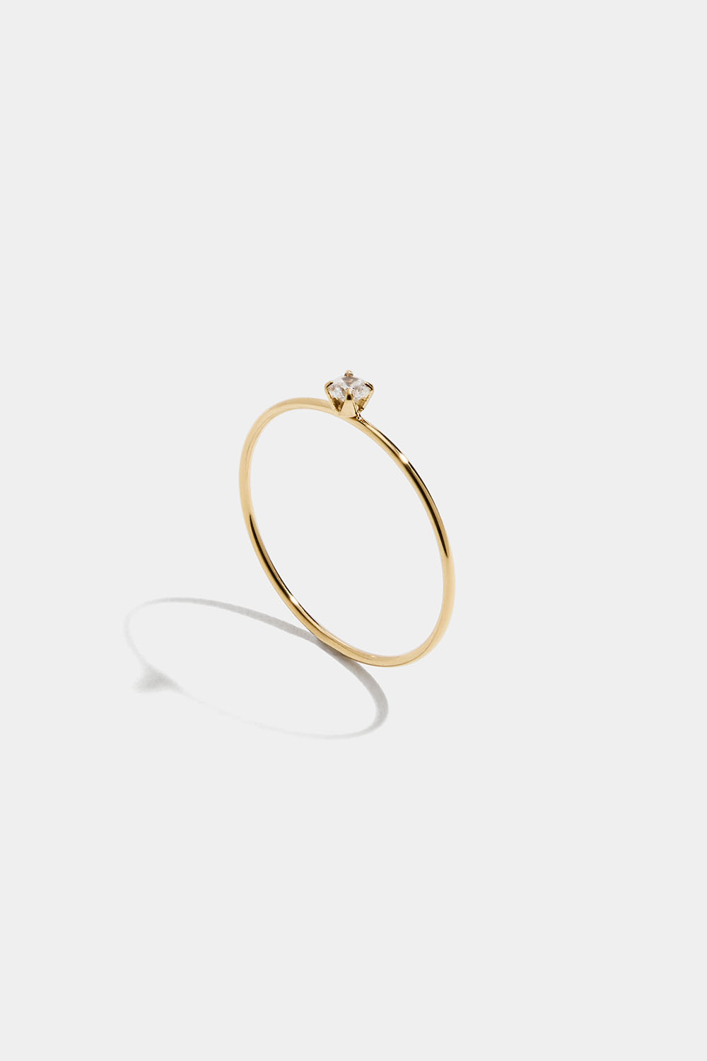 Tynd ring i stål med 18 karat guld og Cubic Zirconia