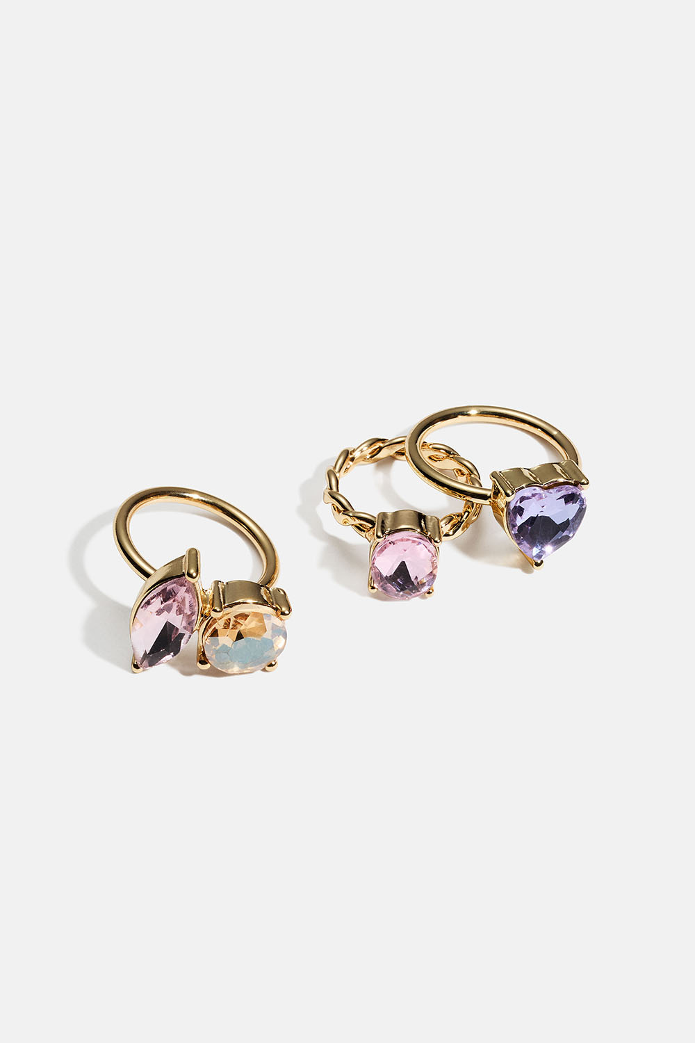 Guldfarvede ringe med store glassten i forskellige design, 3-pak