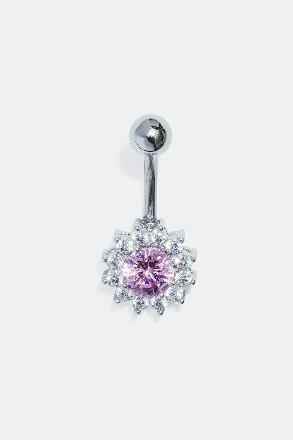 Navlepiercing med dekorativ blomst