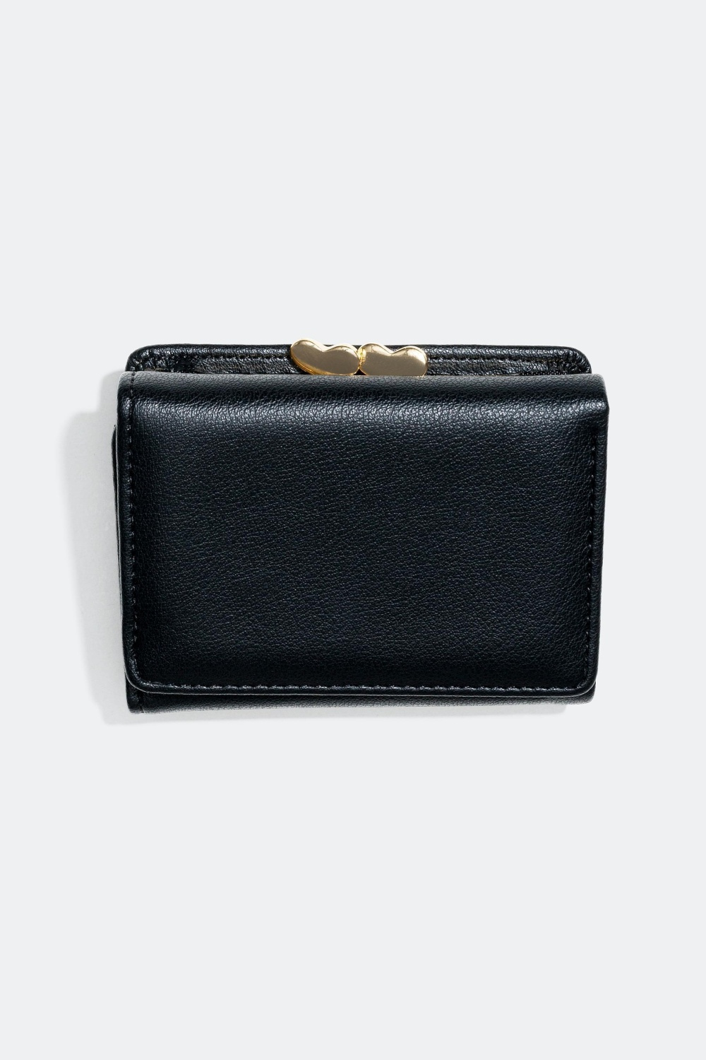 Pung med hjerteformede dekorationer