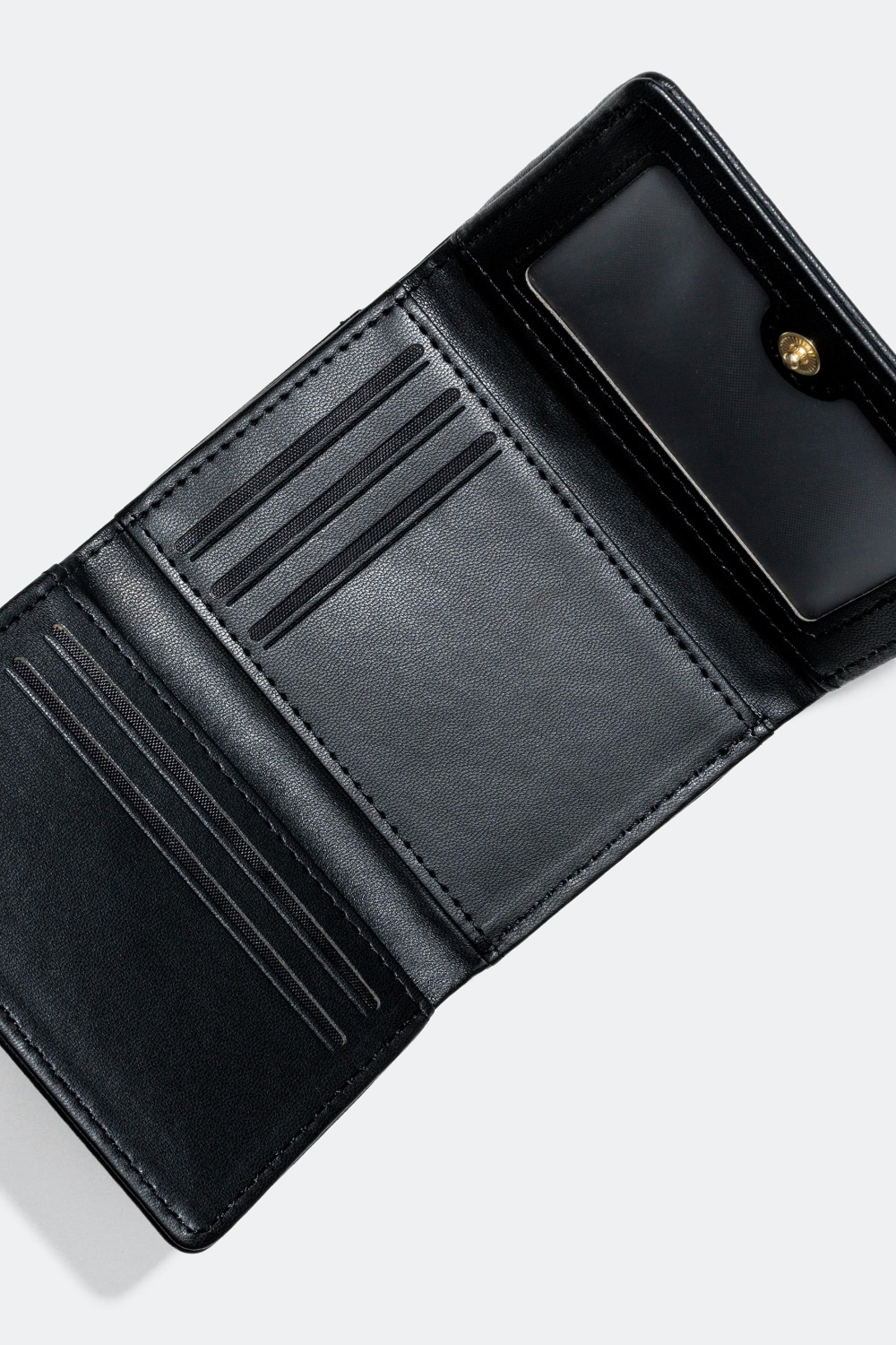 Pung med hjerteformede dekorationer