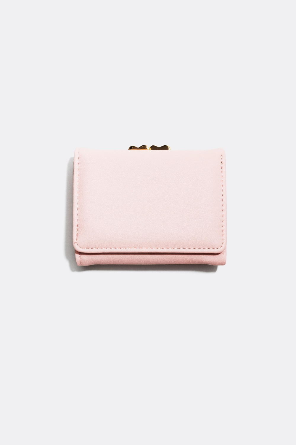 Pung med hjerteformede dekorationer