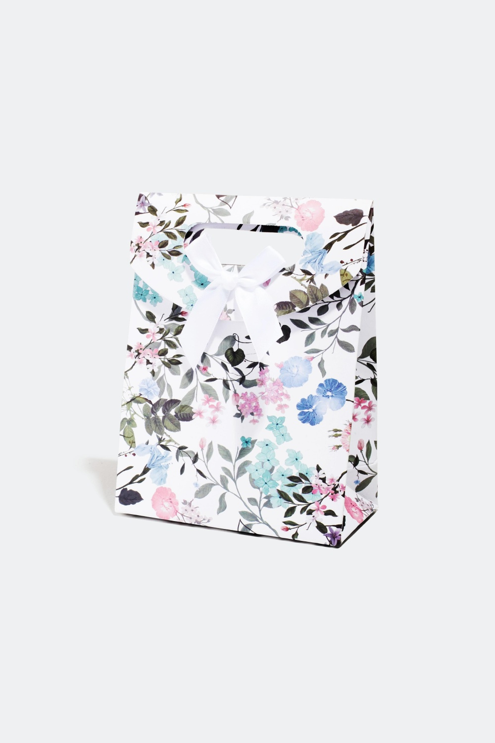 Gavepose i blomstermønster og sløjfe