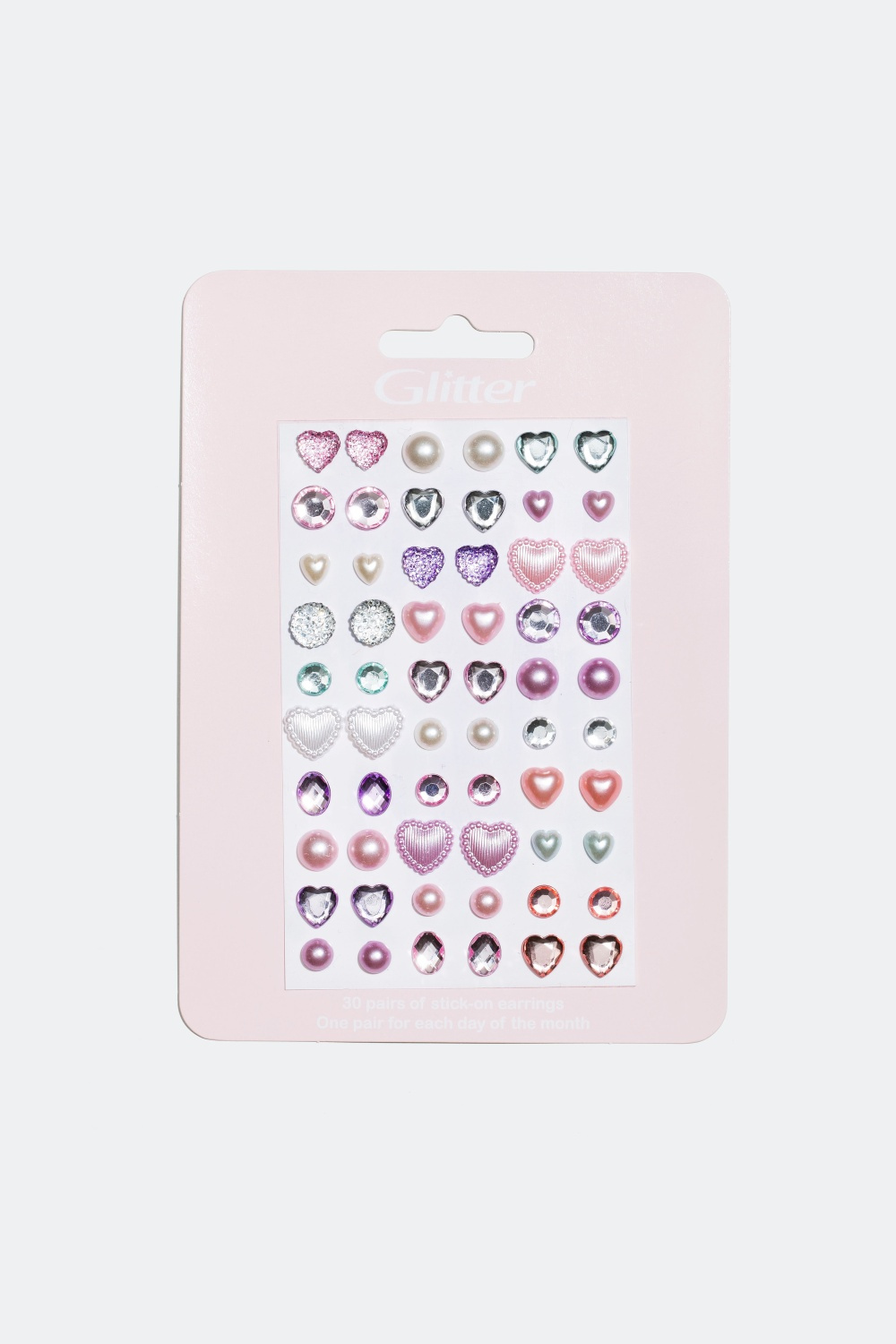 Øreringe, klistermærker med hjerter og perler