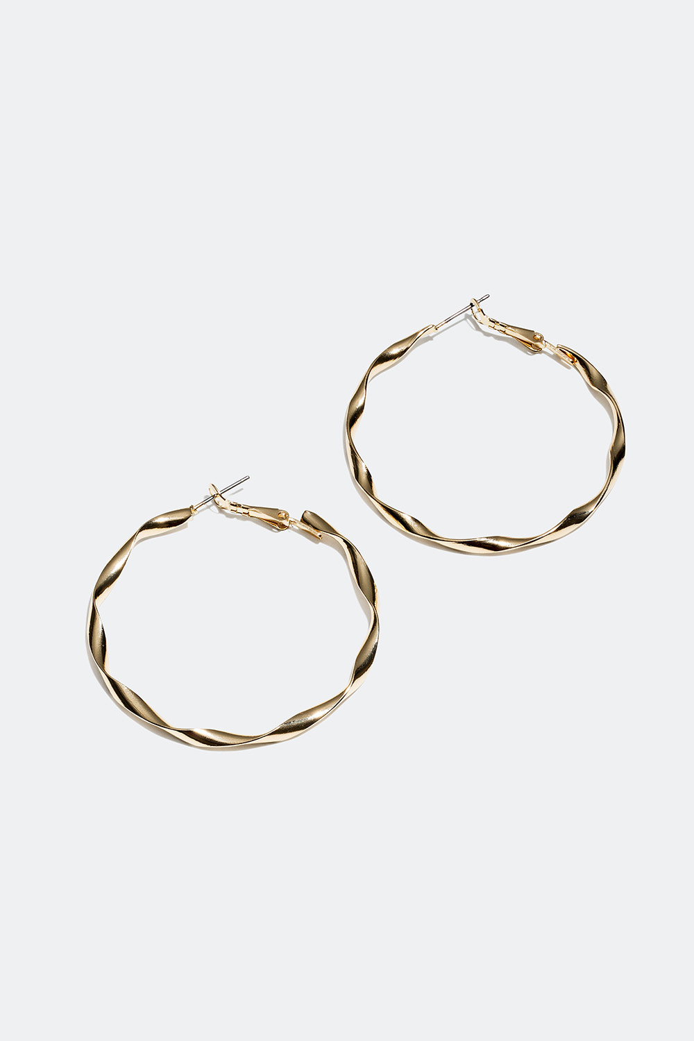 Store og tynde snoede creoler