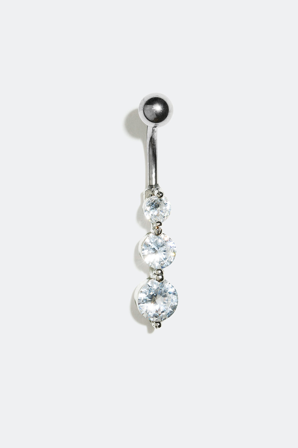 Navlepiercing med tre glassten