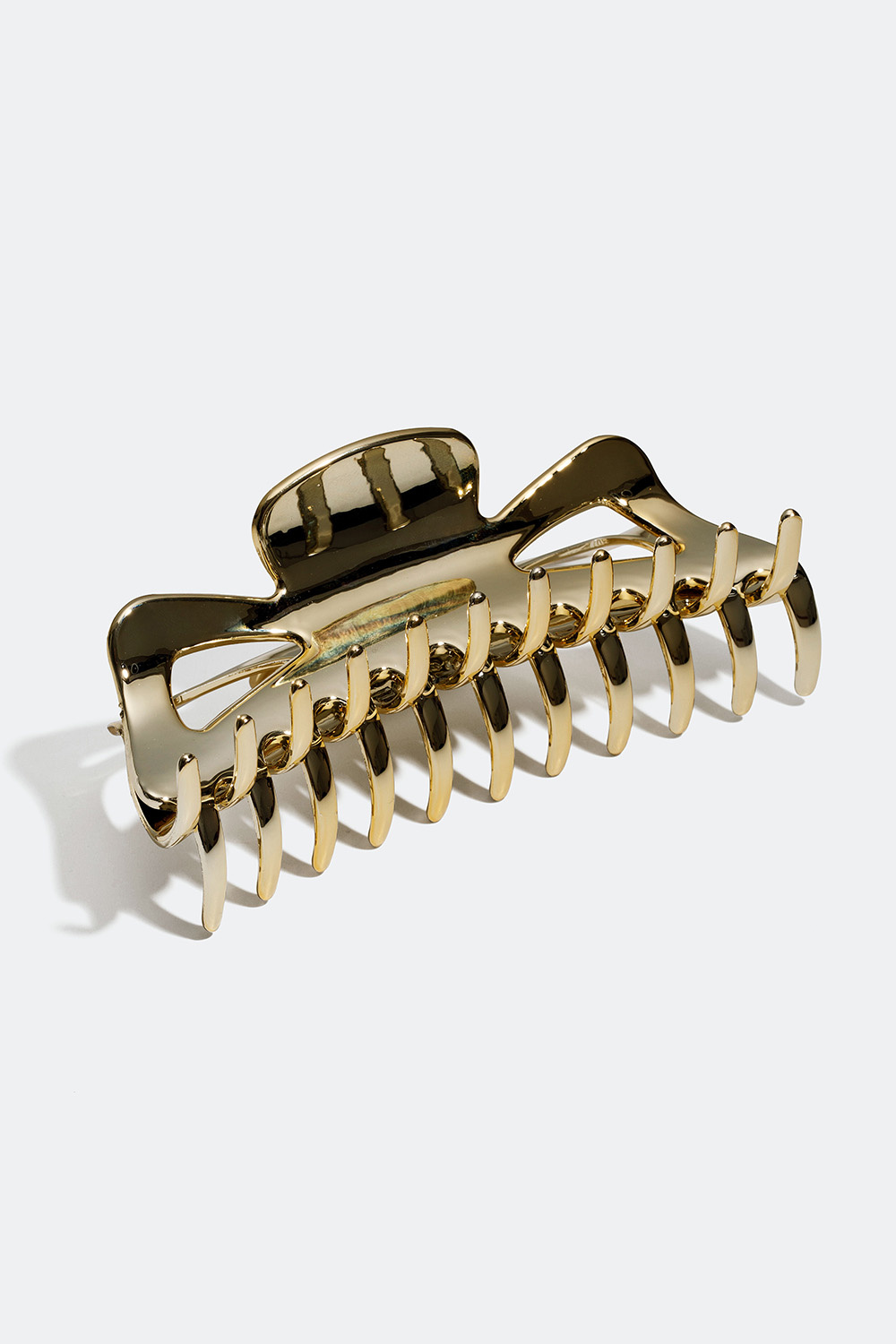 Stor hårspænde i guld