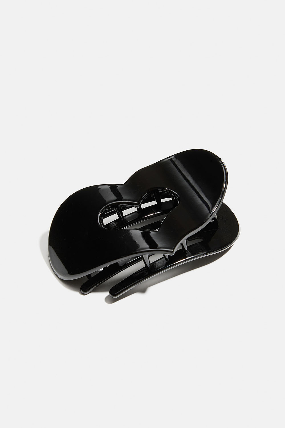 Sort hjerteformet flad hårklemme