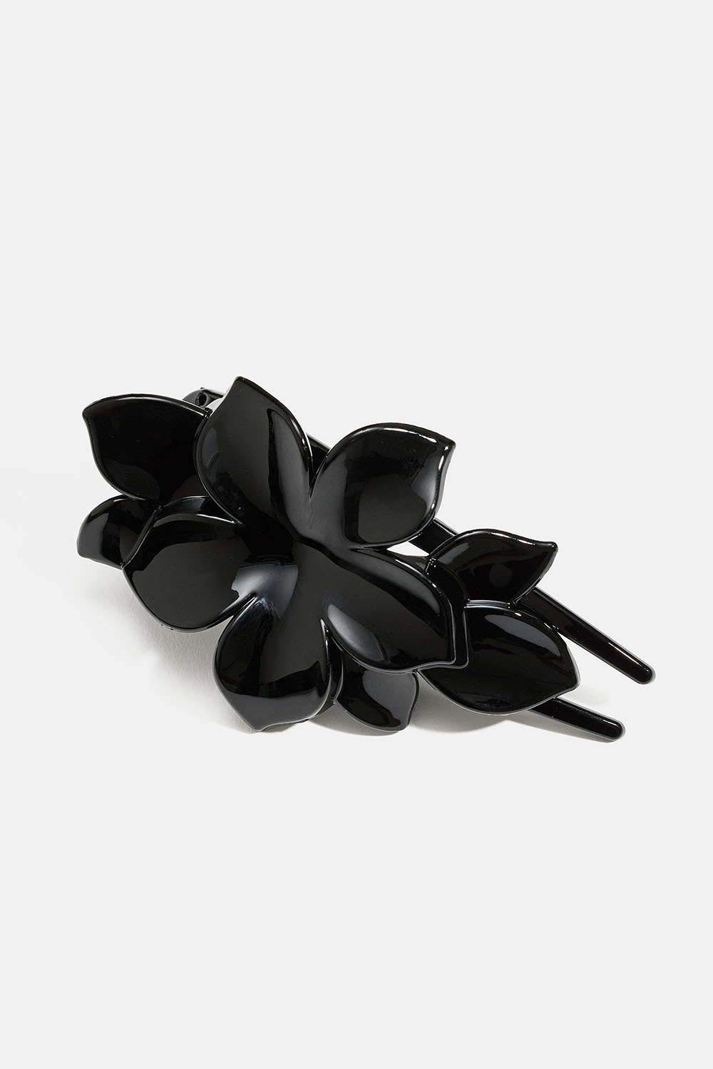Sort hårspænde med blomst