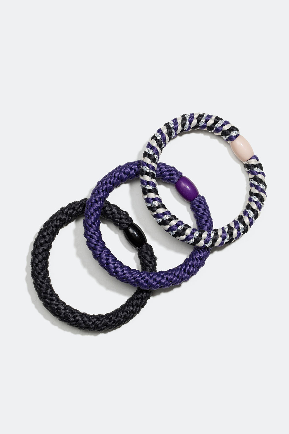 Flettet hårbånd i en blanding af lilla og sort, 3-pak