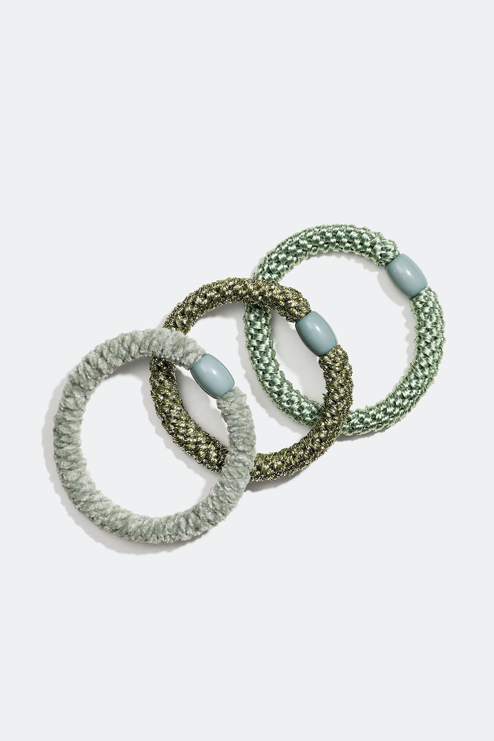 Blanding af flettede hårelastikker i grøn, 3-pak