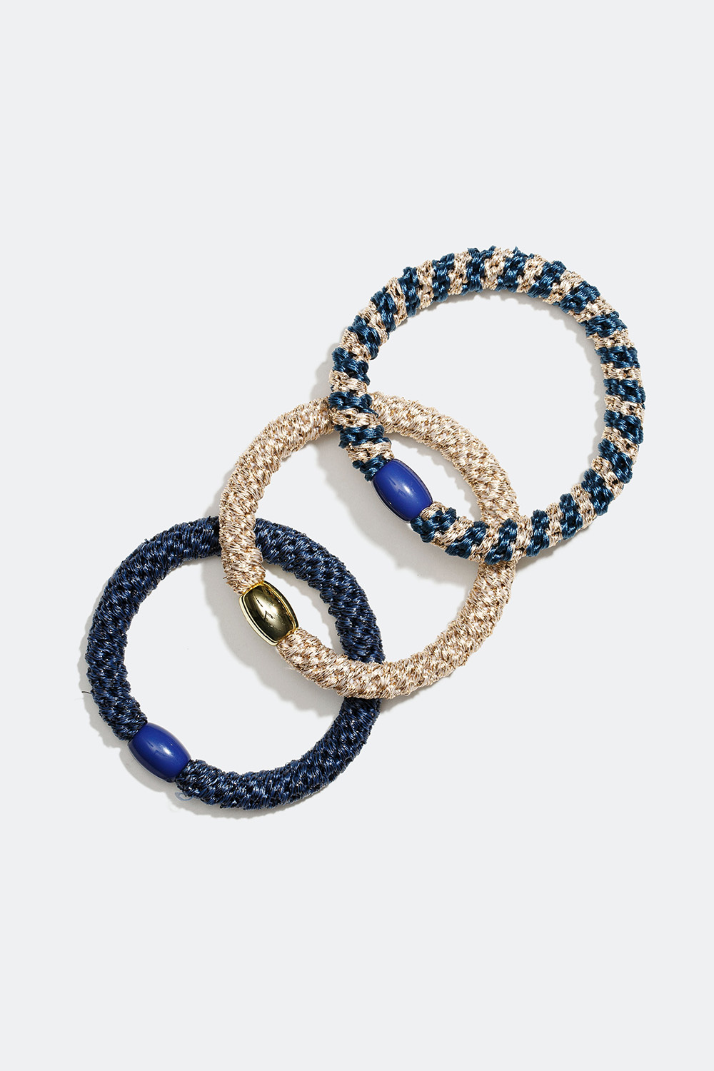 Flettede hårelastikker i blandede nuancer af blå og guld, 3-pak
