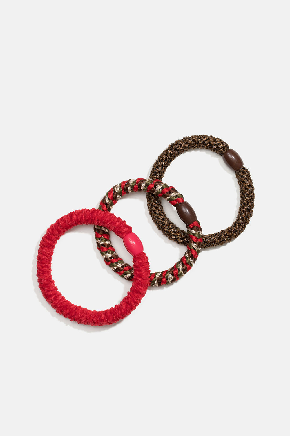 Flettede hårelastikker i et miks af brun og rød, 3-pak