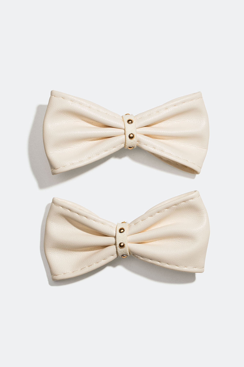 Hårspænde med hvide sløjfer i imiteret læder, 2-pak