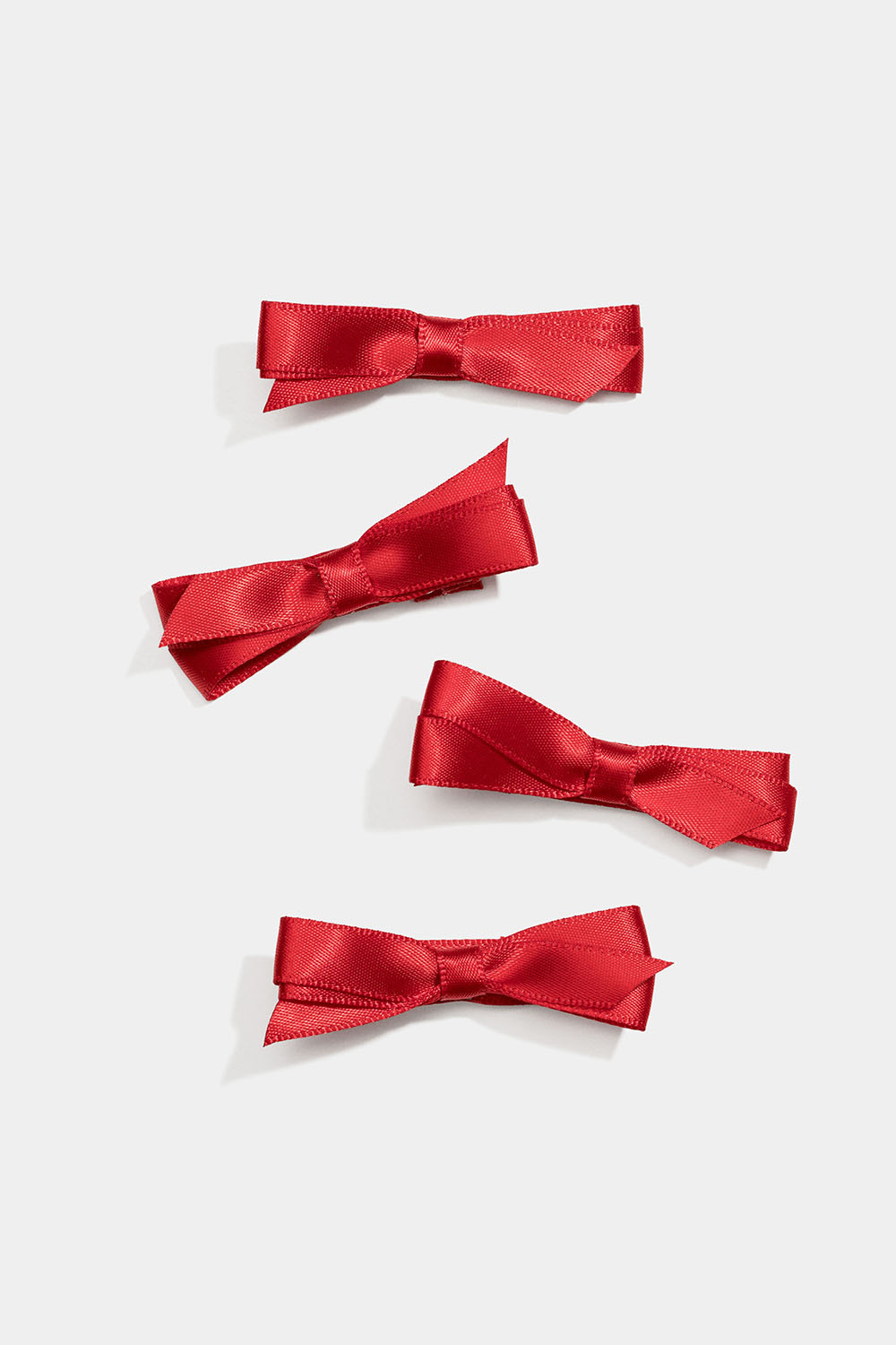 Hårspænde med små, røde sløjfer, 4-pak