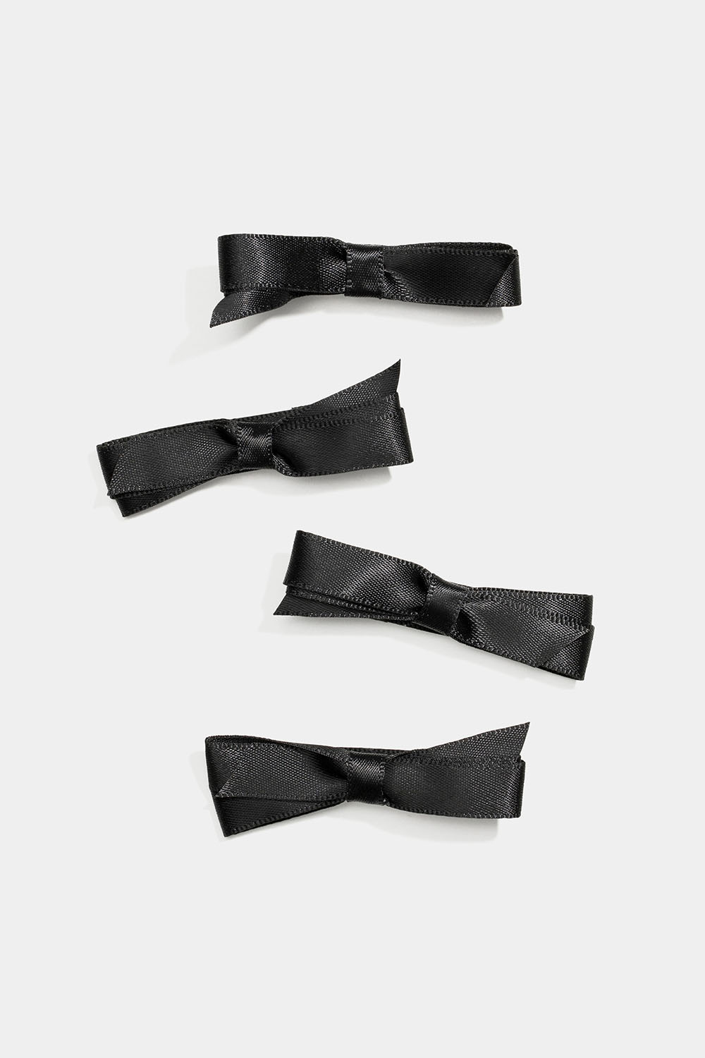Hårspænde med små, sorte sløjfer, 4-pak