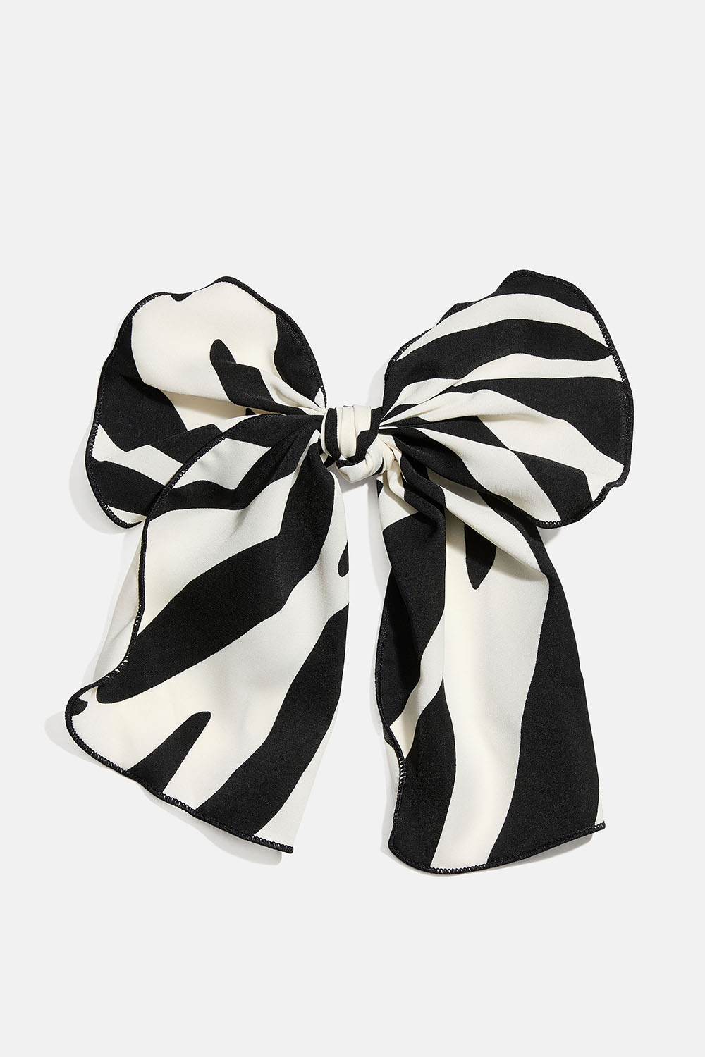 Hårspænde med sløjfe i zebramønsteret stof