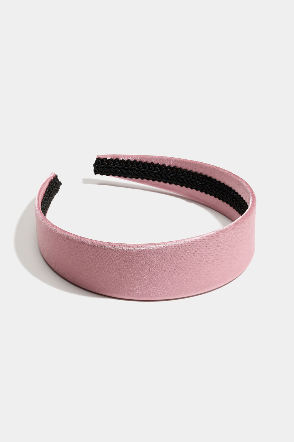 Lyserød hårbøjle i blankt stof