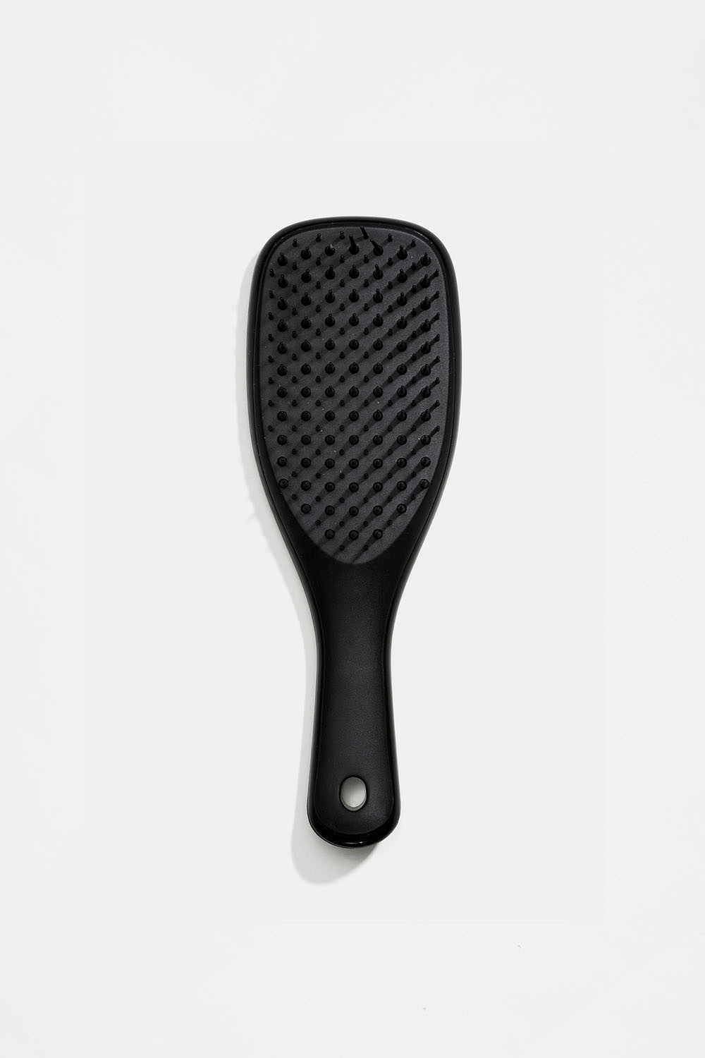 Lille, sort detangler-hårbørste