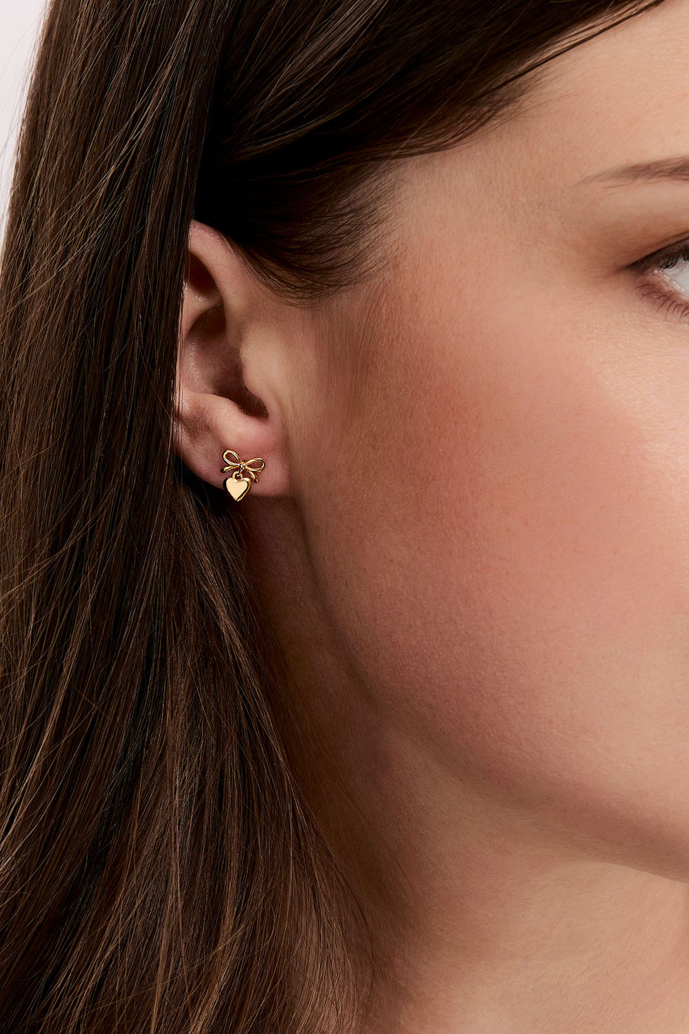Øreringe i 18k forgyldt ægte sølv med sløjfe og hjerte