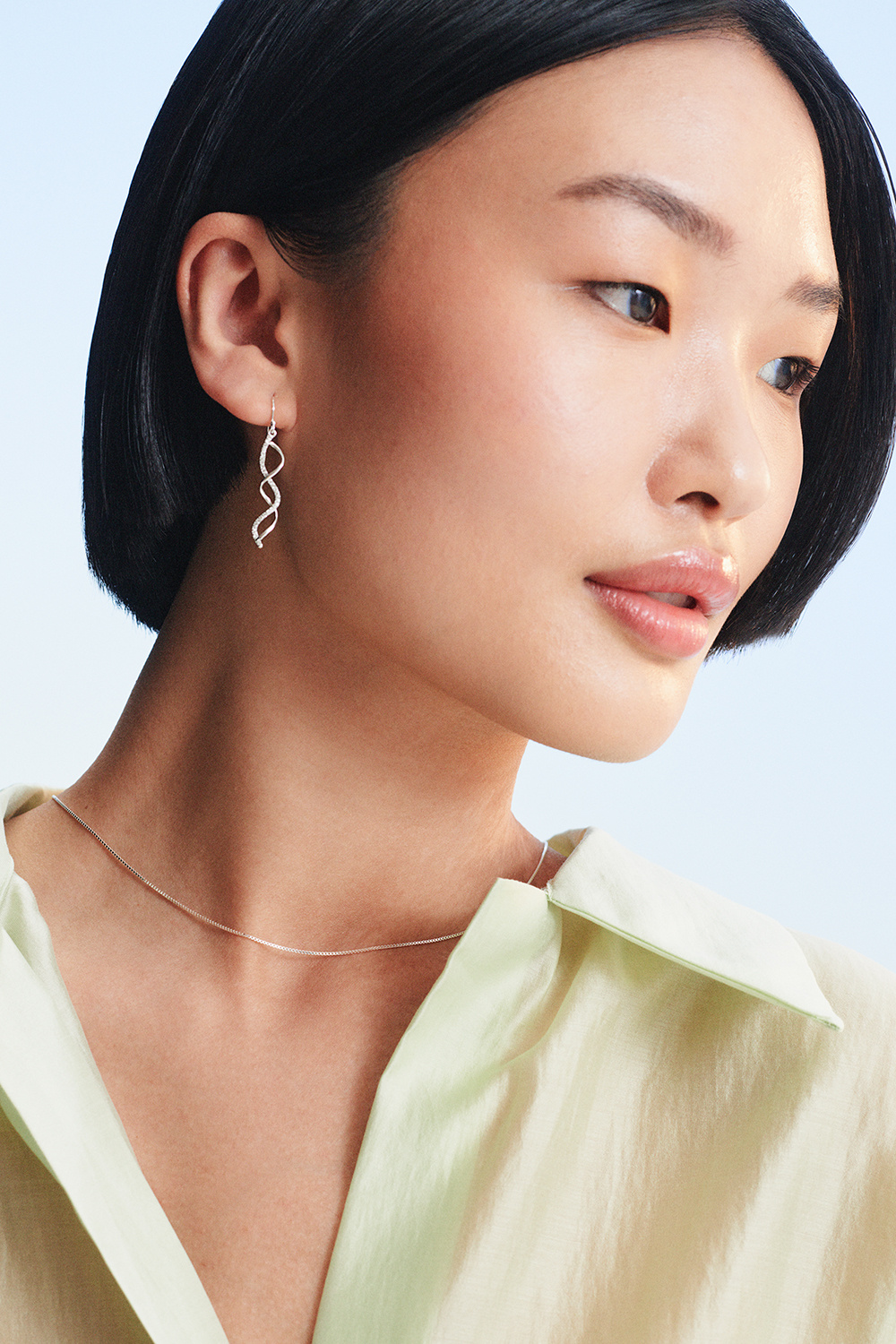 Snoede øreringe i ægte sølv med kubisk zirkonia