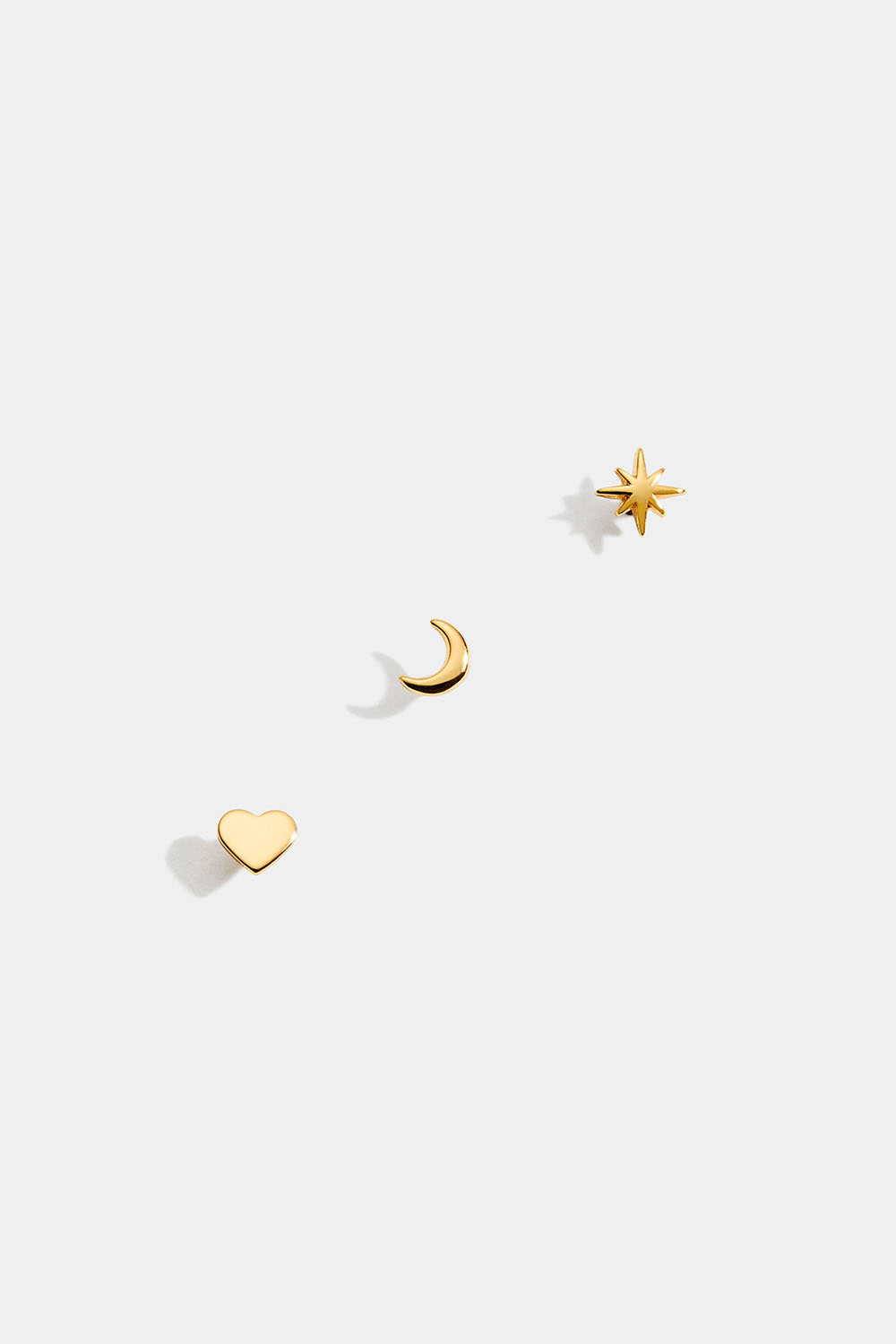 Miniørestikker i 18k guldbelagt sølv, stjerne, måne og hjerte